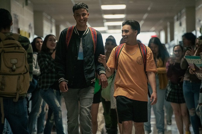 Jimmy Holiday (Kauchani Bratt) and and teammate Devin Sampson-Craig (Bryson Badonie) anticipating a big game, in "Rez Ball." (Wise Entertainment/Netflix)