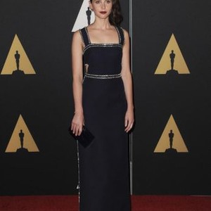 Felicity Jones (wearing a Prada dress) at arrivals for The 2014 Governors Awards Hosted by AMPAS, Ray Dolby Ballroom at Hollywood and Highland Center, Los Angeles, CA November 8, 2014. Photo By: David Longendyke/Everett Collection