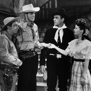 BOSS OF BOOM TOWN, from left: Fuzzy Knight, Rod Cameron, Tom Tyler, Vivian Austin, 1944