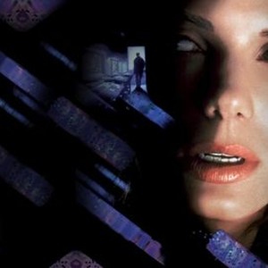 The Net (1995) is a really fun dial-up internet thriller