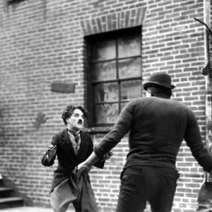 THE KID, from left: Charlie Chaplin, Charles Reisner, 1921