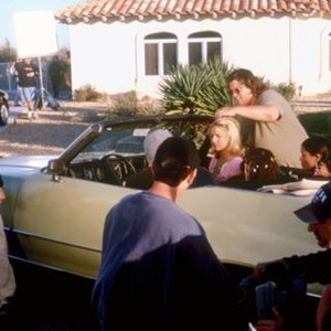 CROSSROADS, director Tamra Davis (left), Britney Spears (center, right, in car), on set, 2002. ©Columbia