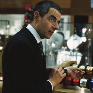 Rufus (ROWAN ATKINSON), indispensable behind a  department store counter, in Richard Curtis' romantic comedy Love Actually. photo 20