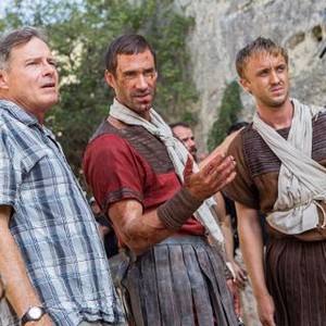 RISEN, from left: director Kevin Reynolds, Joseph Fiennes, Tom Felton, on set, 2016. ph: Rosie Collins/© Sony Pictures Releasing