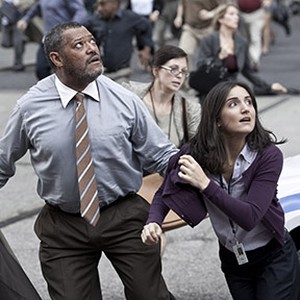 Laurence Fishburne as Perry White and Rebecca Buller as Jenny Olsen in "Man of Steel." photo 1