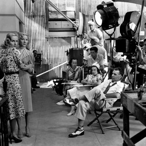 TRUE CONFESSION, Wesley Ruggles (in two-toned shoes), directing (from left), Carole Lombard, Una Merkel, 1937