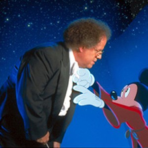 Acclaimed conductor James Levine gets a helping hand from the Sorcerer's Apprentice as he prepares to take up his baton. photo 17