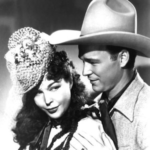 IN OLD CHEYENNE, from left: Joan Woodbury, Roy Rogers, 1941