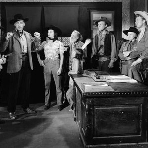 THE FIGHTING REDHEAD, from left: Bob Duncan, John Hart, Peggy Stewart, Emmett Lynn, Don Reynolds, Lane Bradford, Marin Sais, Jim Bannon, 1949
