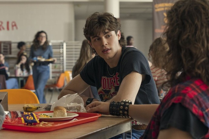Wannabe jock Derrick Smart (Jack Champion, center) hangs out with fellow Mötley Crüe fans at high school lunch, in "Everything's Going to Be Great." (Lionsgate)