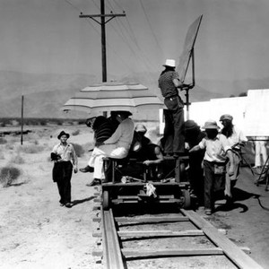 THEY MADE ME A CRIMINAL, John Garfield, (left), director Busby Berkeley, (in white), on location in Indio, CA, September 1938
