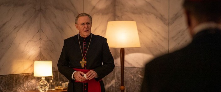 Cardinal Tremblay (John Lithgow, L) is shocked by Cardinal Lawrence's (Ralph Fiennes) accusations, in "Conclave." (Focus Features)