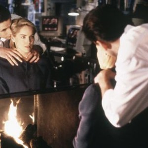 SLIVER, from left in reflection: William Baldwin, sharon Stone, 1993, © Paramount