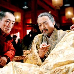CURSE OF THE GOLDEN FLOWER, (aka MAN CHENG JIN DAI HUANG JIN JIA), director Zhang Yimou, Chow Yun-Fat, on set, 2006. ©Sony Pictures Classics