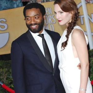 Chiwetel Ejiofor, Sara Mercer at arrivals for The 20th Annual Screen Actors Guild Awards (SAGs) - ARRIVALS 2, The Shrine Auditorium, Los Angeles, CA January 18, 2014. Photo By: Elizabeth Goodenough/Everett Collection