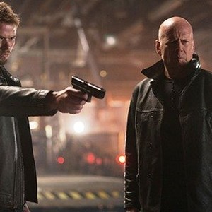 (L-R) Kellan Lutz as Harry Turner and Bruce Willis as Leonard Turner in "Extraction." photo 18