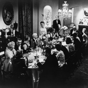A KING IN NEW YORK, at table, third, fourth and fifth from left: Joan Ingram, Charlie Chaplin, Dawn Addams (standing), 1957 akiny1957cc-fsct007(akiny1957cc-fsct007)