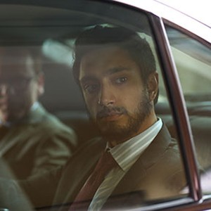 (L-R) Kiefer Sutherland as Jim Cross and Riz Ahmed as Changez in "The Reluctant Fundamentalist." photo 9