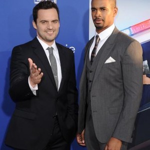 Jake Johnson, Damon Wayans Jr. at arrivals for LET''S BE COPS Premiere, The ArcLight Hollywood, Hollywood, CA August 7, 2014. Photo By: Dee Cercone/Everett Collection