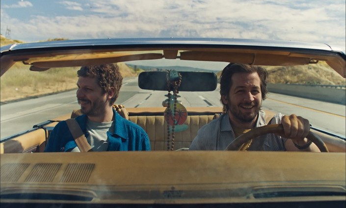 Glenn (Michael Cera, L) drives to Sacramento with his old friend Rickey (Michael Angarano) whom he doesn't like anymore, in "Sacramento." (Vertical)